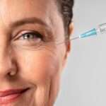 smiley-elder-woman-using-injection-her-eye-wrinkles_23-2148672366