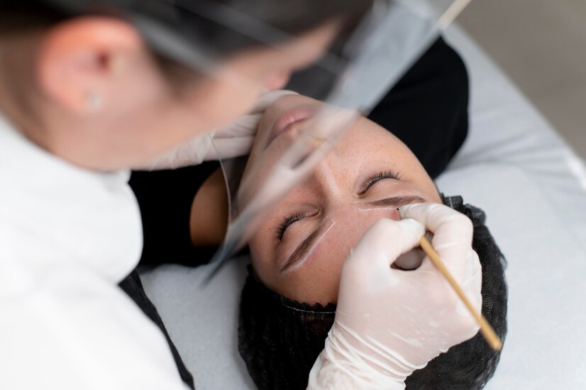 young-woman-going-through-microblading-treatment_23-2149102657