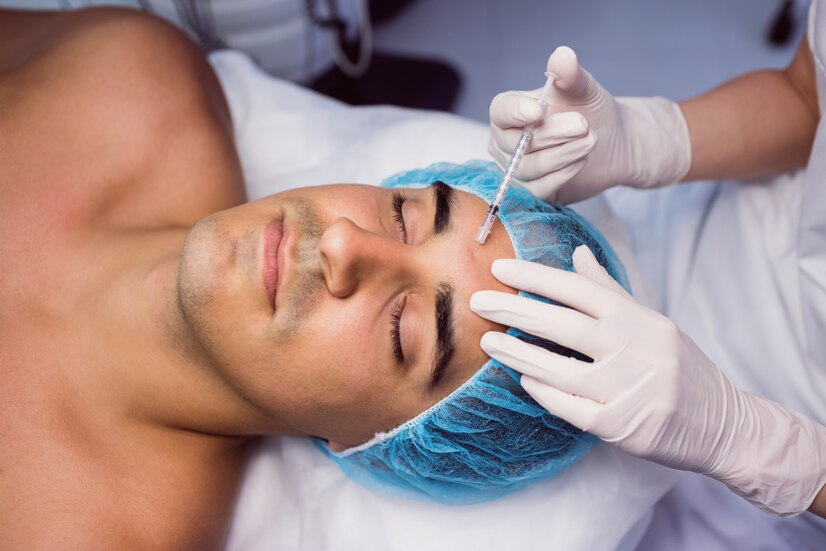 man-receiving-botox-injection-his-forehead_107420-65181